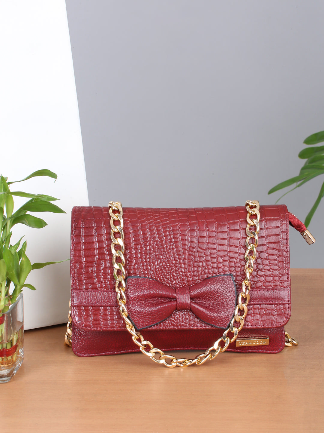 Women's textured Leather Sling Bag With Bow - Main Image