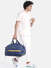 Load image into Gallery viewer, Navy Blue &amp; Yellow Brand Logo Print Medium Duffel Trolley Bag
